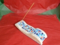 Incense stick holder,  hand carved Tetbury limestone with mosaic inlay, £55
