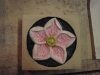 'Hellebore' carved and painted Tetbury limestone      