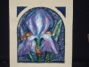 Iris, carved and painted Tetbury limestone