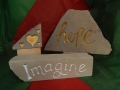 Hope, hand carved and painted £58, Hearts,  hand carved and painted £20, Imagine, hand carved and painted £68