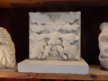 Hand carved creatures in Tetbury limestone, Portland limestone and Tetbury limestone