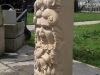 Tetbury limestone face with leaves and flowers. 
