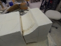 Treat it as a flat surface-just with a curve