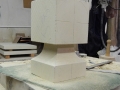 Work round the neck creating mitres