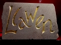 Hand carved and gilded Forest of Dean sandstone.