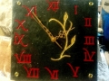 Welsh slate clock Red paint and gold leaf