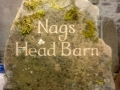 Mossy house sign