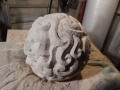 Detail of carving curly hair.