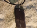 3 piece welsh slate pendant with sterling silver stitching.