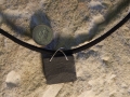 Welsh slate pendant with sterling silver cross over bezel.