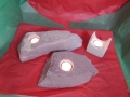 Tealight holders, Forest of Dean sandstone. Prices start at £15. The one at the back on the left has an Oak leaf and acorns carved into it and this one is £60.