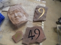 commissions and a carving in progress